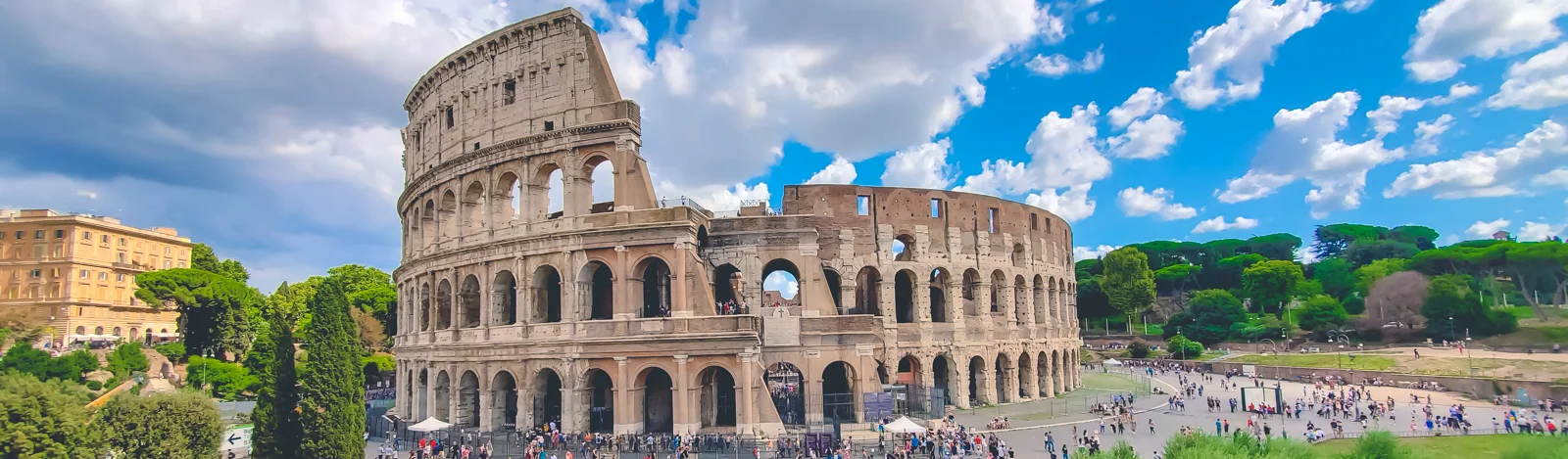 Colosseum with clear blue sky and clouds, Rome,Italy. Rome architecture and landmark. Rome Colosseum is one of the best known monuments of Rome and Italy